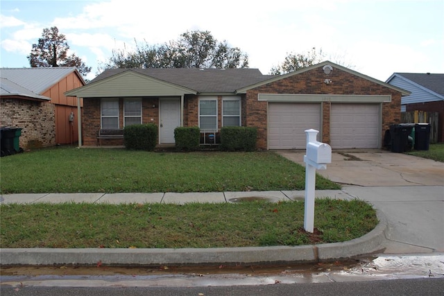 ranch-style home featuring a front yard and a garage