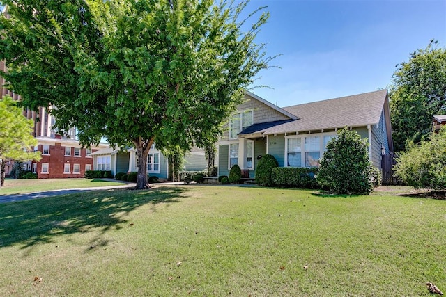 view of front of house with a front lawn