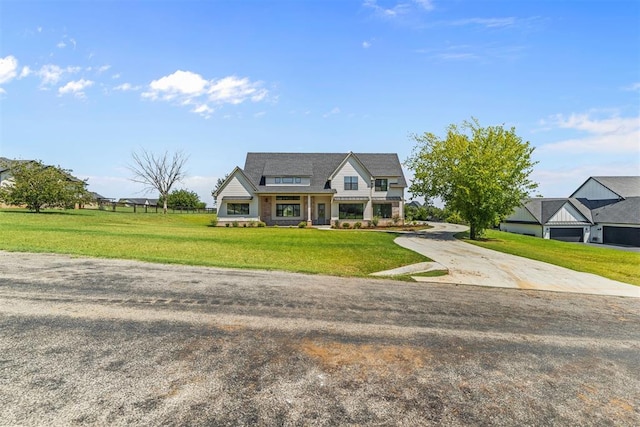 view of front facade with a front lawn