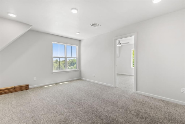 additional living space with recessed lighting, carpet flooring, visible vents, and baseboards