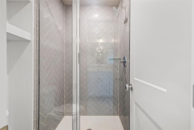 full bathroom with a shower stall