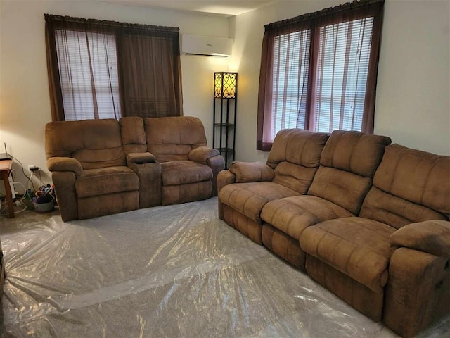 living room featuring a wall unit AC