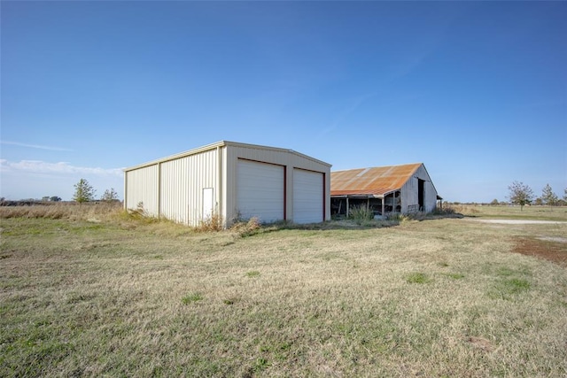 view of outbuilding with a garage