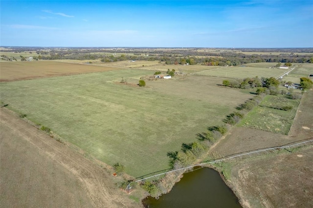 bird's eye view featuring a rural view and a water view