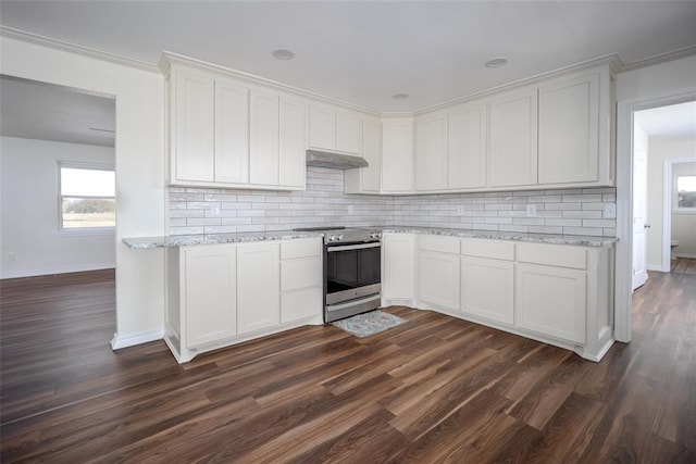 kitchen with tasteful backsplash, electric stove, white cabinetry, and dark hardwood / wood-style floors