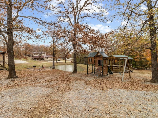 view of yard with a playground