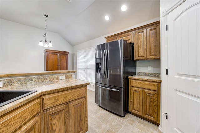 kitchen with vaulted ceiling, pendant lighting, light tile patterned floors, a notable chandelier, and stainless steel fridge with ice dispenser