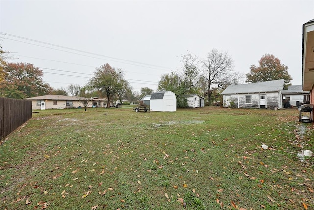 view of yard with a storage shed