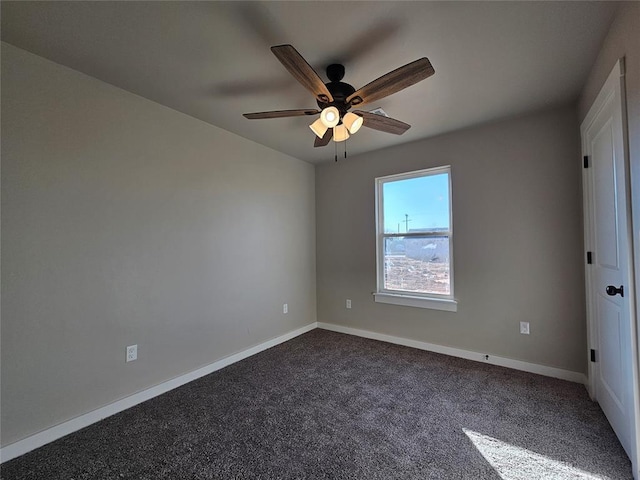 unfurnished room with carpet and ceiling fan