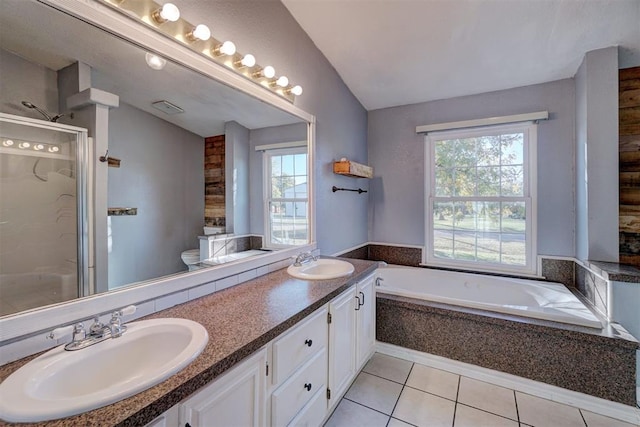 full bathroom featuring tile patterned flooring, vaulted ceiling, toilet, vanity, and shower with separate bathtub