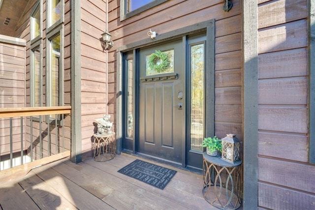 doorway to property featuring a porch