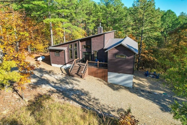 view of front of house with a wooden deck