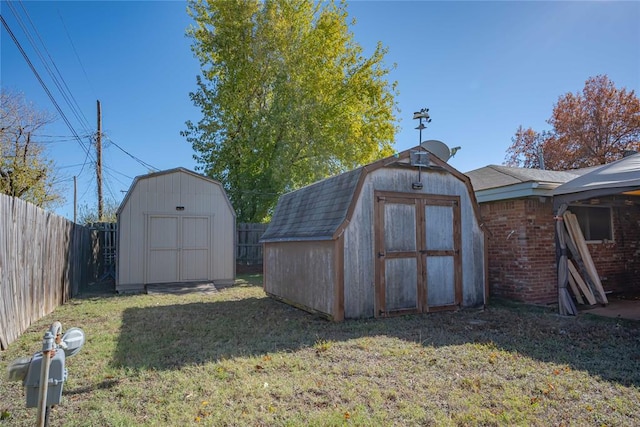 view of outdoor structure with a lawn