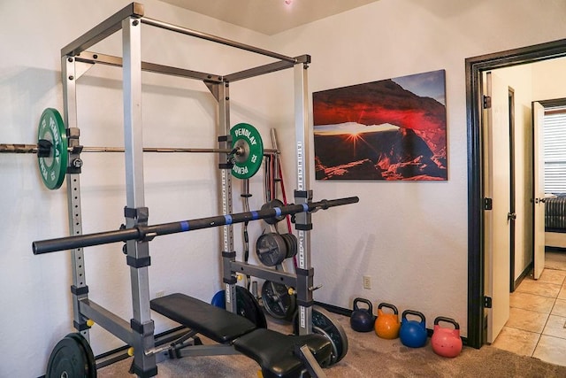 workout area featuring carpet floors