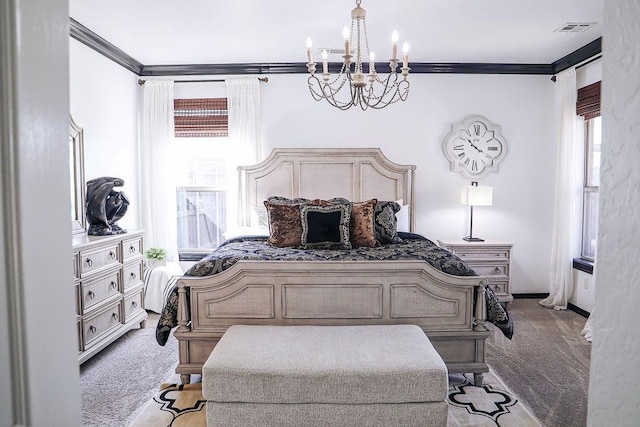 carpeted bedroom featuring baseboards, a notable chandelier, crown molding, and visible vents