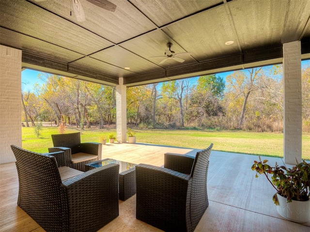 view of patio featuring ceiling fan