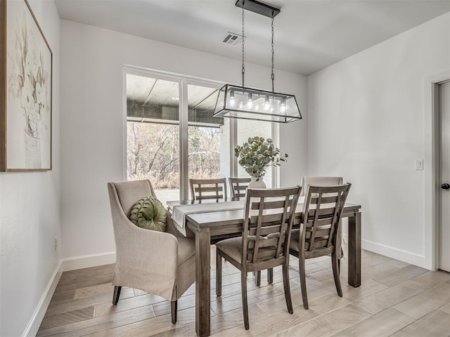 dining area featuring light hardwood / wood-style flooring