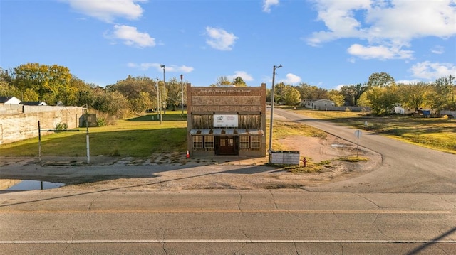 surrounding community with a yard