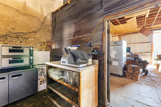 kitchen featuring stainless steel refrigerator