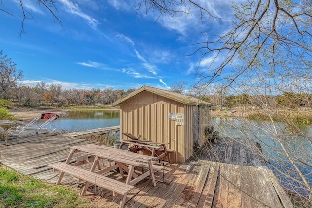 view of dock with a water view