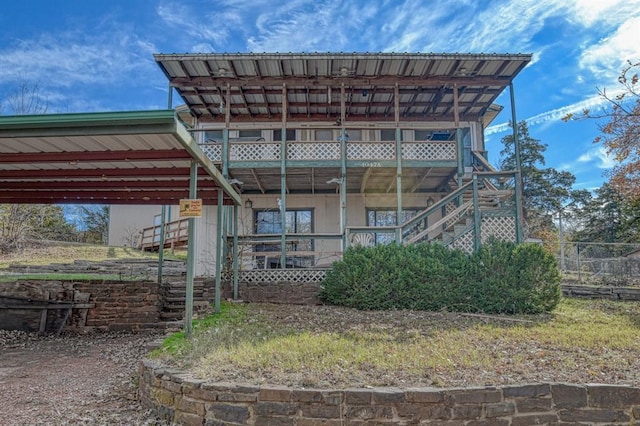 21351 E Tenth St, Hinton, OK 73047 - back of property featuring stairway and a deck