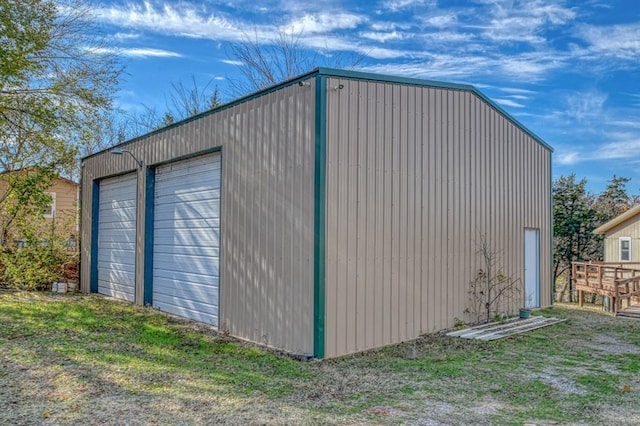 view of outdoor structure with a garage