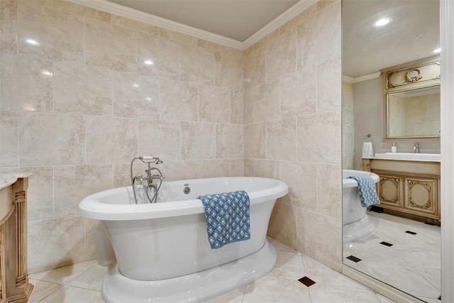 bathroom featuring vanity and tile walls