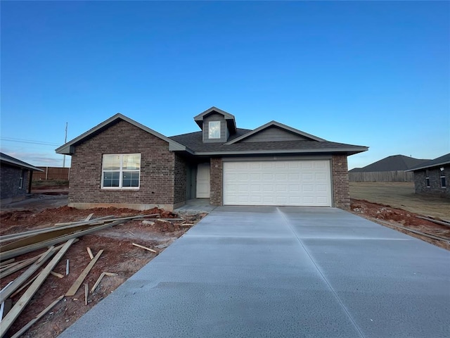 view of front of property featuring a garage