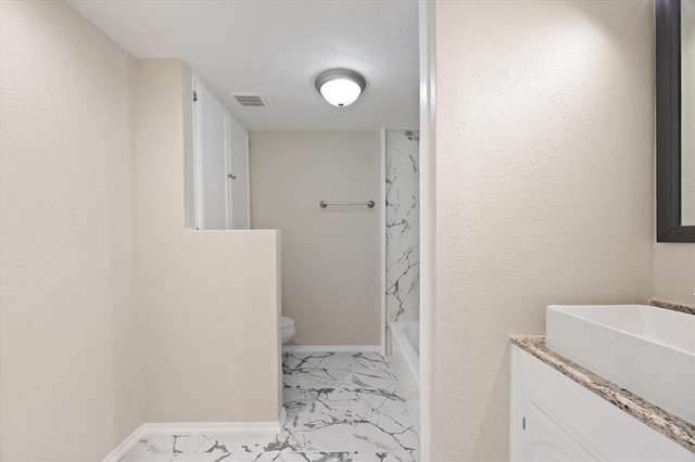 full bathroom featuring vanity, toilet, and tub / shower combination