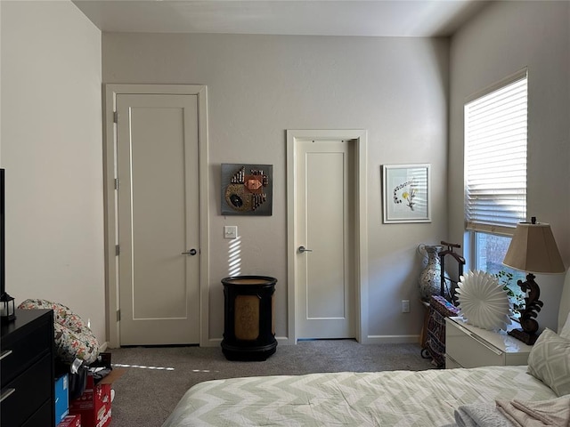 bedroom with dark carpet