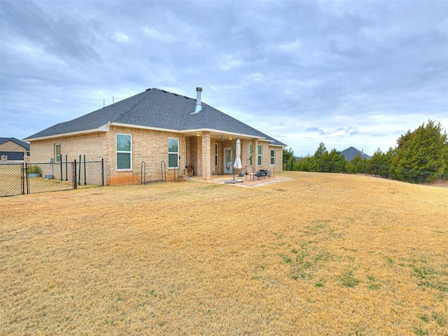 back of property with a patio area