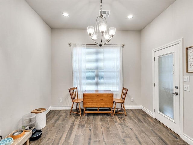 dining area featuring a chandelier