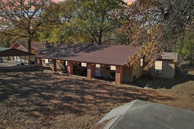 view of front facade featuring a carport