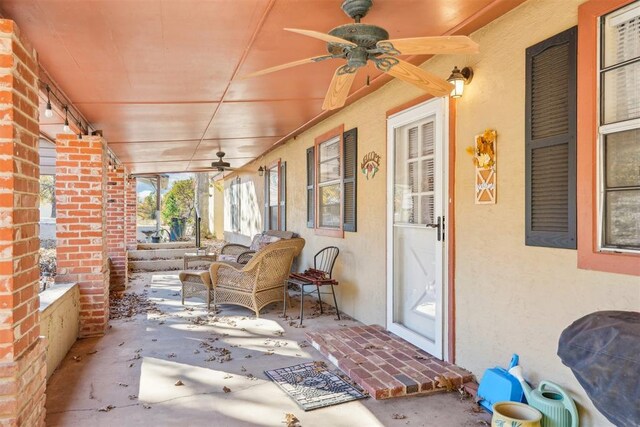 view of patio / terrace featuring ceiling fan