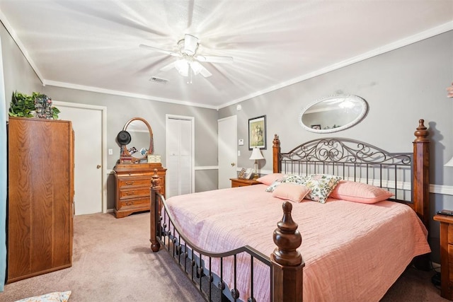 bedroom featuring ceiling fan, crown molding, and light carpet