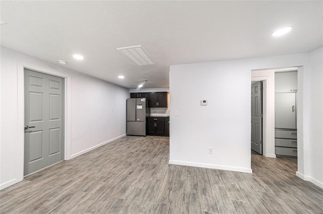 unfurnished living room featuring light wood-type flooring