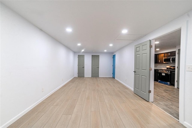 unfurnished room featuring light hardwood / wood-style floors