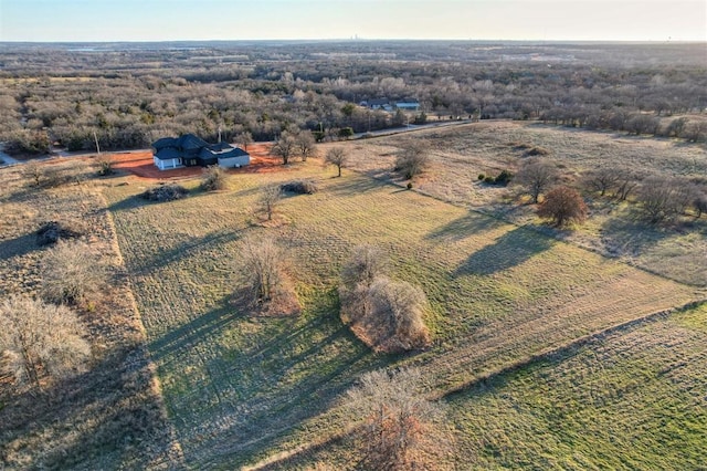 birds eye view of property featuring a rural view