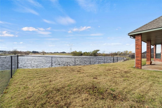 view of yard with a water view