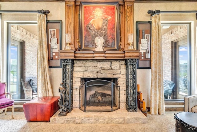 interior space with carpet flooring and a fireplace