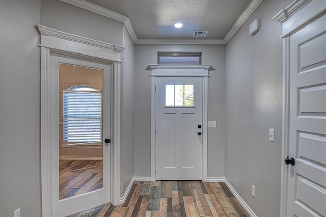 entryway featuring crown molding and dark wood-type flooring