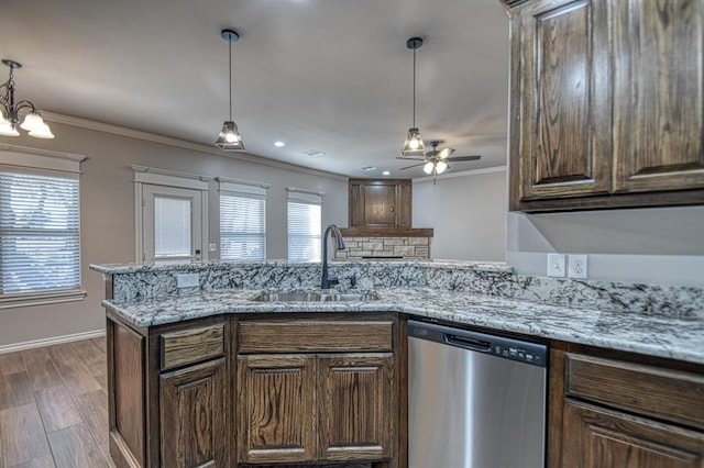 kitchen with dishwasher, ceiling fan with notable chandelier, sink, dark hardwood / wood-style floors, and ornamental molding