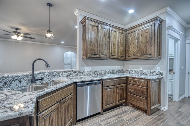 kitchen with ceiling fan, dishwasher, sink, light wood-type flooring, and ornamental molding