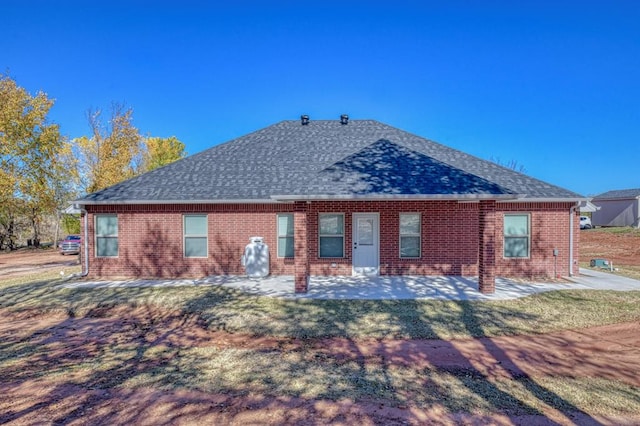 rear view of house featuring a patio area