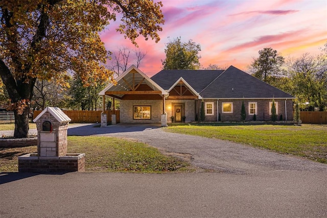 view of front of home featuring a yard