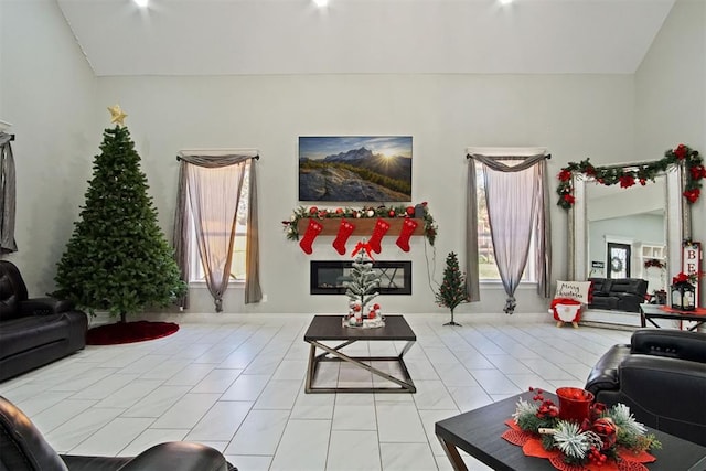 tiled living room featuring lofted ceiling