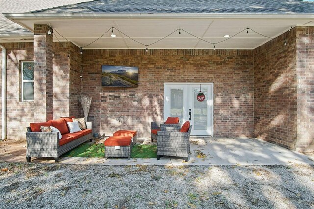 view of patio with french doors and an outdoor hangout area