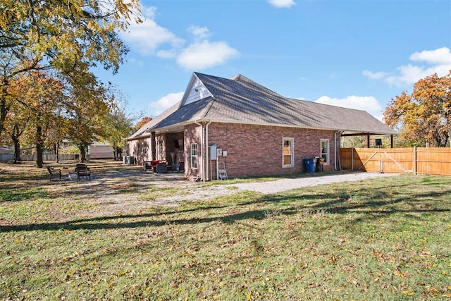 view of home's exterior featuring a yard