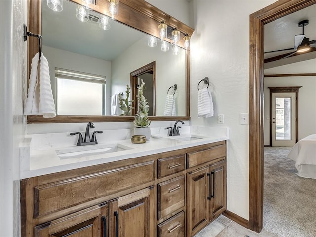 bathroom with vanity and a healthy amount of sunlight