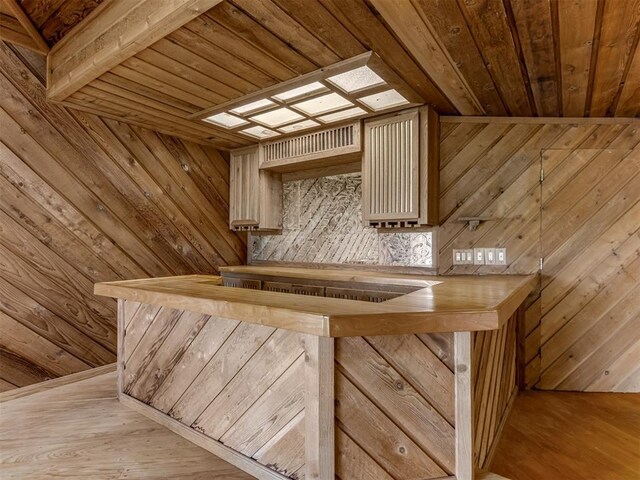 1501 S Avery Ave, Midwest City, OK 73130 - indoor dry bar featuring wooden ceiling, wood walls, and wood finished floors